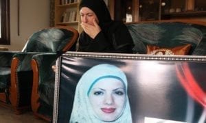 Fatima Baradiya, mother of Aya Baradiya, with a picture of her daughter Photograph: Gali Tibbon